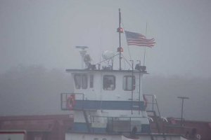 image of a ship in sea fog